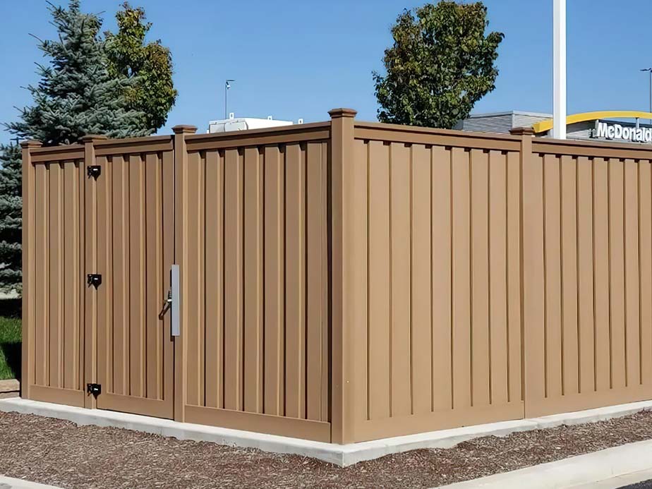 Commercial dumpster enclosure with double swing gate