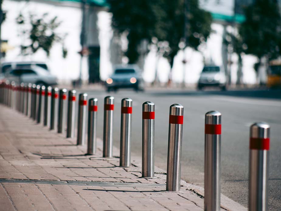 Steel Bollards along the side of a road
